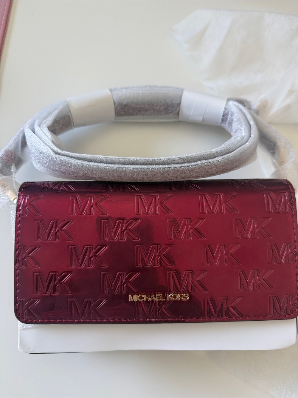 Michael Kors Metallic Burgundy MK Embossed Crossbody Wallet